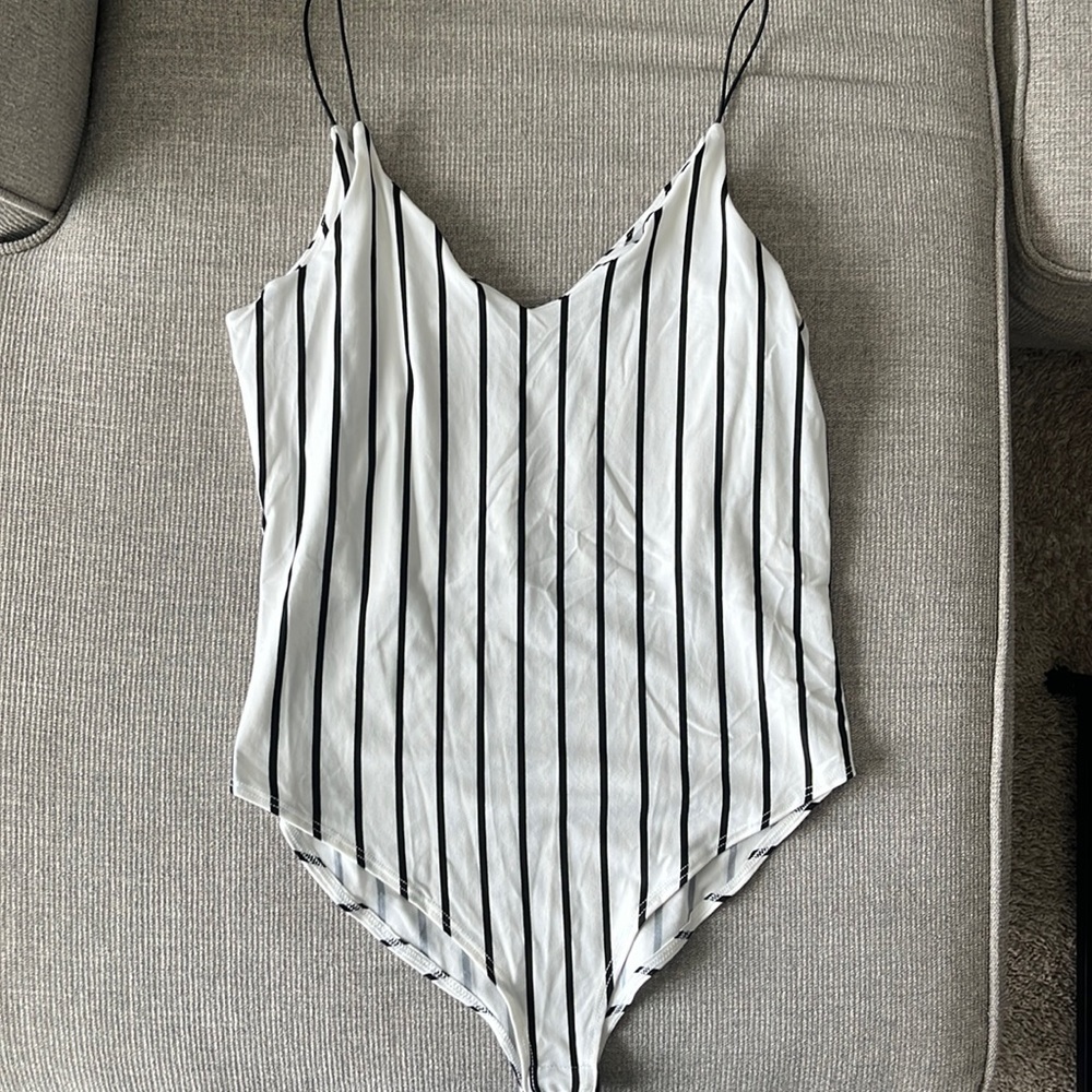 Never worn body suit